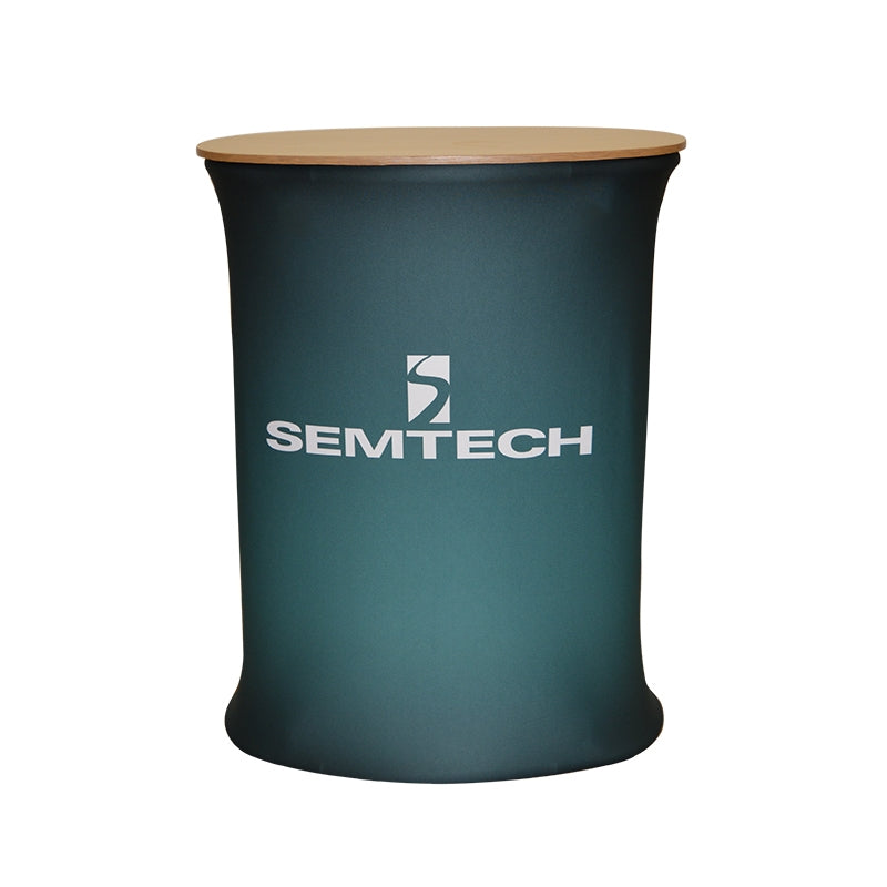 The 10ft Timberline Wave Canopy Kit 8 by Affordable Exhibit Displays is a portable trade show counter with a light wood top and dark SEG fabric body, featuring the SEMTECH logo in white on the front.