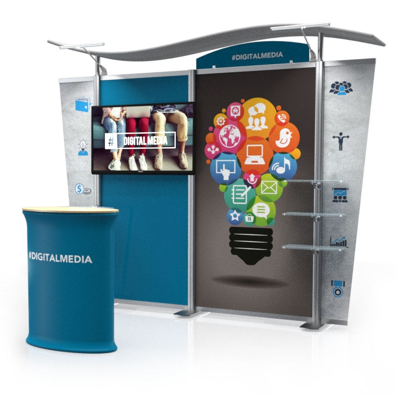 The 10ft Timberline Wave Canopy Kit 8 by Affordable Exhibit Displays features a #DIGITALMEDIA SEG fabric graphic with hands holding phones, a colorful media-themed lightbulb, and a blue front counter for trade shows.