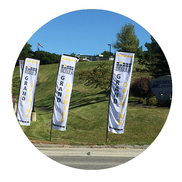 Modula grand opening sail flags by Affordable Displays
