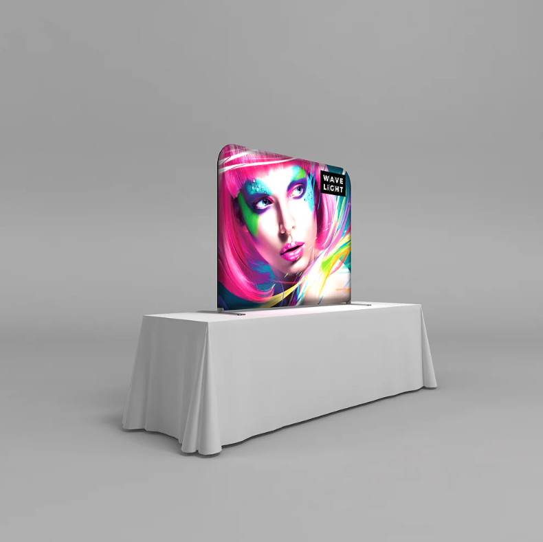 7ft wave light table top display on a gray background. left side angle. 